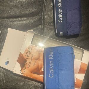 2 Calvin Klein boxer briefs